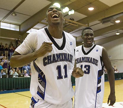Rashaad Ubah (11) and Chris Curtis will always remember the day Chaminade took down a team from a Div. I power conference.  (AP)