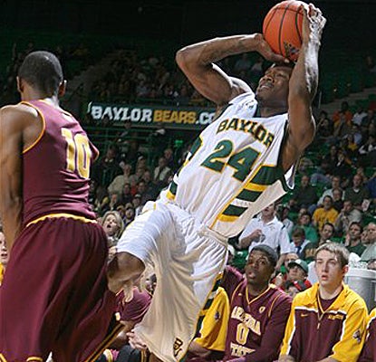 Baylor's LaceDarius Dunn, the game's leading scorer with 24 points, falls backward while shooting. (Getty Images)