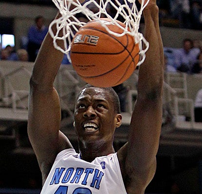 North Carolina freshman forward Harrison Barnes dunks on the Seminoles on Sunday. (AP)
