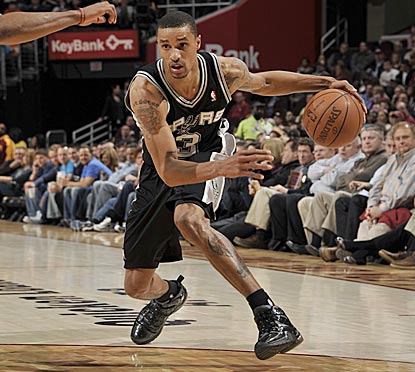 George Hill, helping fill in for an injured Tony Parker, contributes 22 points and five assists in a winning effort.  (Getty Images)