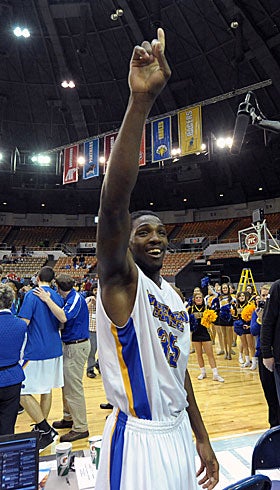 A moment please, Louisville, Morehead State's Kenneth Faried would like a word. (US Presswire)