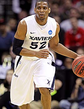 Xavier's Tu Holloway is arguably the best point guard in the nation. (Getty Images)