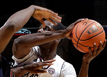 Ray Turner goes up for a shot against Liberty.  He scores a career-high 20 points on 9-11 shooting. (Getty Images)