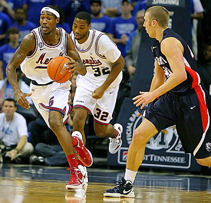 Will Barton drives upcourt against Belmont defenders, leading Memphis to the win with a game-high 23 points. (US Presswire)
