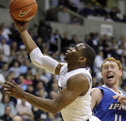 John Peckinpaugh (right) can only watch as Tu Holloway drops 24 points -- 16 in the second half -- against IPFW. (AP)