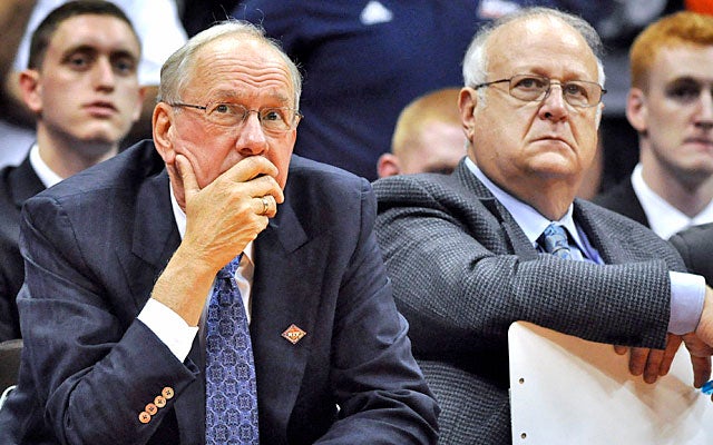 Jim Boeheim on longtime assistant Bernie Fine (right): 'I have never seen or witnessed anything.' (AP)