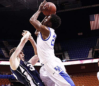 Doron Lamb pushes the Nittany Lions around to score 26 points for Kentucky, which jumps out to a 16-5 lead. (US Presswire)