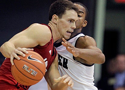 Kyle Kuric (17 points) hits two from downtown late to give Butler a rare loss at Hinkle Fieldhouse. (AP)