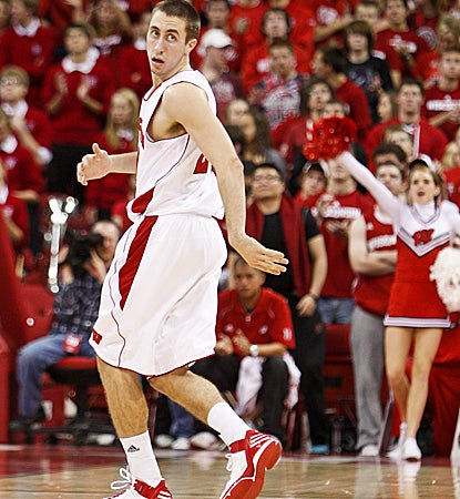 Josh Gasser struts back on D after making one of his four treys on the night. (AP)