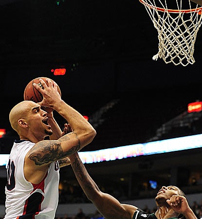 Robert Sacre keys the Gonzaga rout with a double-double (16 points, 10 boards). (US Presswire)