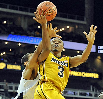 Missouri's Matt Pressey draws a foul during the Tigers' convincing win over Notre Dame. (US Presswire)