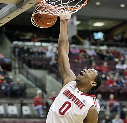 Ohio State's Jared Sullinger scores 27 and adds 13 boards in the Buckeyes' win over North Florida. (AP)
