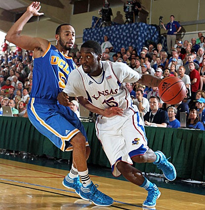 The Kansas Jayhawks' Elijah Johnson scores 23 points to help beat the UCLA Bruins in the semifinals of the Maui Invitational. (US Presswire)