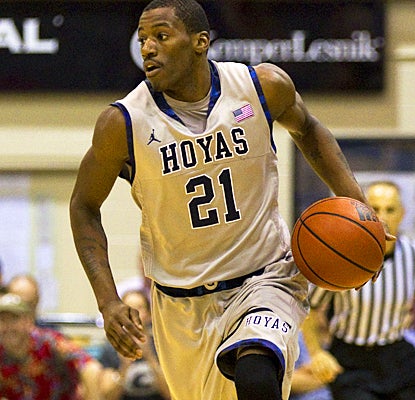 Jason Clark comes up huge vs. No. 8 Memphis with 26 points, including the 3-pointer that puts the Hoyas up for good. (AP)