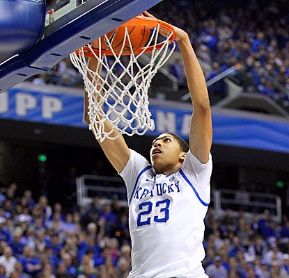 Kentucky's Anthony Davis slams home two of his 12 points against Radford. He also grabs six rebounds in the win. (Getty Images)