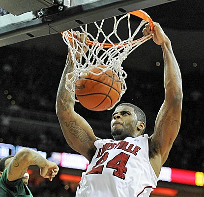Louisville forward Shane Behanan scores 11 points, including this dunk, against Ohio. (US Presswire)