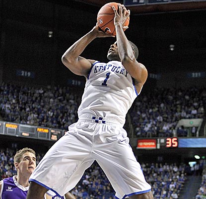Kentucky's Darius Miller, who could rejoin the starting lineup soon, scores 19 points vs. Portland. (Getty Images)