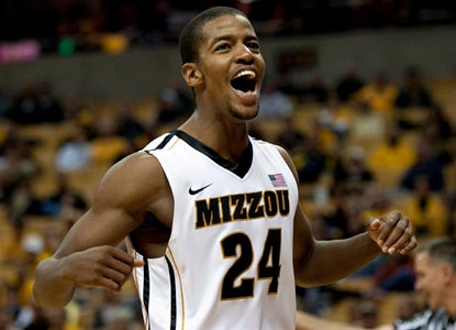 Three-point specialist Kim English, the Big 12's leading long-range shooter, connects on 7 of 10 from downtown. (AP)