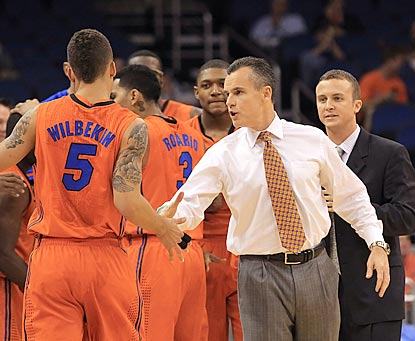 Billy Donovan encourages his team during a key first-half run that helps makes him the youngest active member of the 400 Club.  (US Presswire)