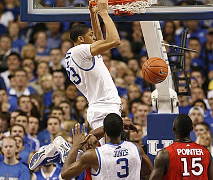 Anthony Davis, throwing down two of his 15 points, accounts for eight of UK's school-record 18 blocks to go with his 15 boards. (US Presswire)
