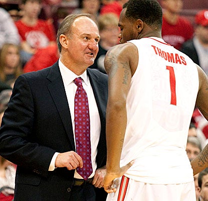 Three-hundred-game winner Thad Matta gives kudos to Buckeyes F Deshaun Thomas, who finishes with 11 points. (US Presswire)