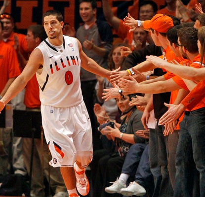 Illinois' Sam Maniscalco celebrates with fans as the Illini improve their record to 8-0.  (US Presswire)