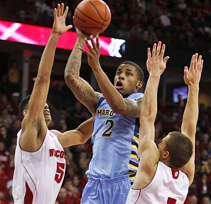 Vander Blue contributes nine points along with eight rebounds as the Golden Eagles snap the Badgers' 23-game home win streak. (AP)