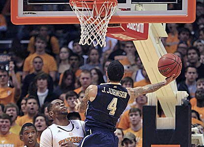 Freshman John Johnson converts a three-point play with two seconds left to seal the win for No. 17 Pitt. (AP)