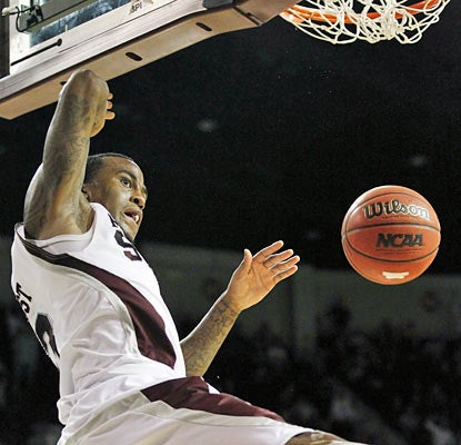 Dee Bost makes his presence felt by finishing with 17 points along with five boards and seven dimes. (AP)
