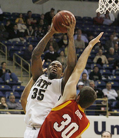 Nasir Robinson goes up strong against VMI's Nick Gore in the second half. Robinson scores 19 points on 8-of-9 shooting.  (US Presswire)