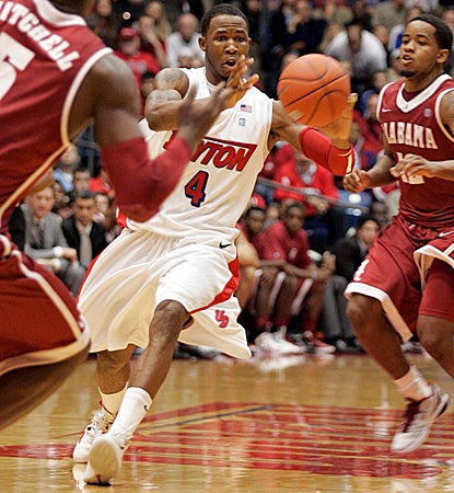 Chris Johnson leads Dayton with 20 points in an upset of No. 16 Alabama. (AP)