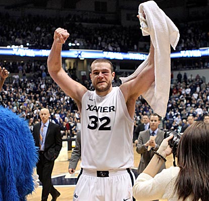 Kenny Frease walks off the court after Xavier's postgame brawl with Cincy. The Musketeers win the game handily. (US Presswire)