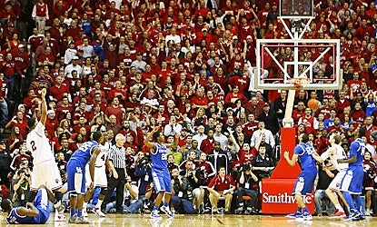 Christian Watford (left) watches as his 3-point shot goes through to give Indiana the win over UK. (US Presswire)