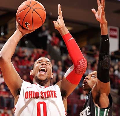 Player of the Year candidate Jared Sullinger posts 12 points and 10 rebounds in his return for the Buckeyes.  (Getty Images)