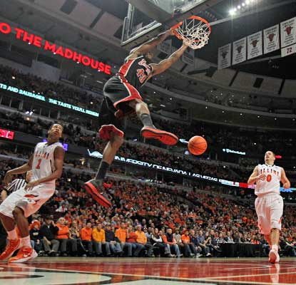 Mike Moser helps UNLV pull off the upset in Chicago with 17 points and 11 rebounds.   (Getty Images)