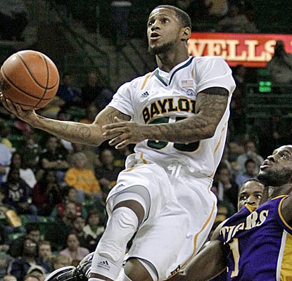 Baylor's Pierre Jackson scores seven points and adds four assists in a win over Paul Quinn. (AP)