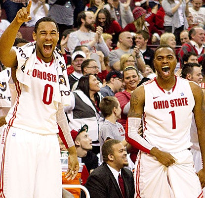  Jared Sullinger (left) and Deshaun Thomas both enjoy big scoring nights in the Buckeyes' lopsided win.  (US Presswire)