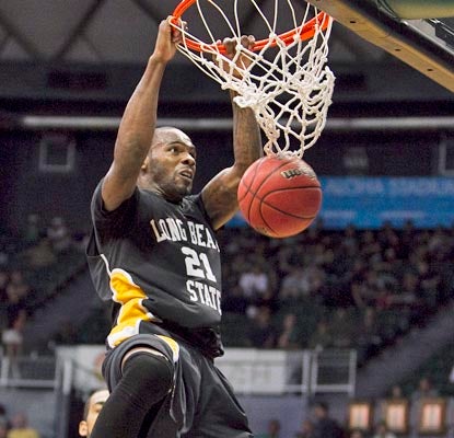 Long Beach State's Larry Anderson gets an easy two points as the 49ers top the Musketeers.  (AP)