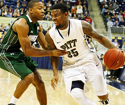 Josh Thompson helps Wagner hold Nasir Robinson and No. 15 Pitt to 39 percent shooting. (US Presswire)