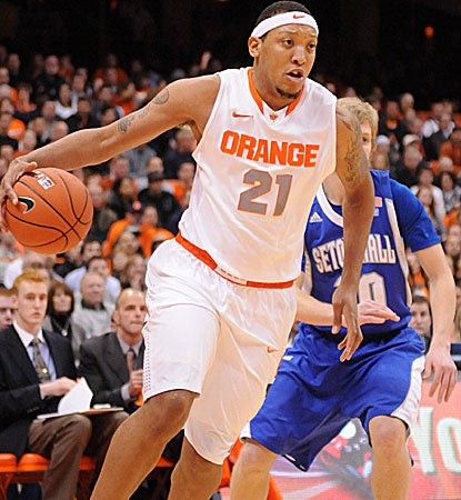 Mookie Jones takes it to the hoop as Syracuse wins in its Big East opener to remain undefeated. (US Presswire)