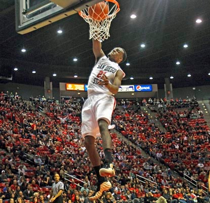 Aztec guard Jamaal Franklin soars for a dunk and finishes the night with 26 points, six steals and 10 rebounds.   (AP)