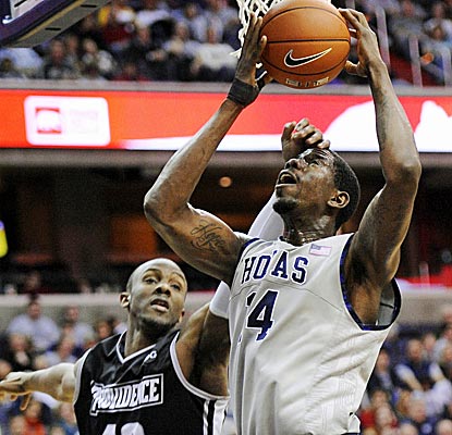 Georgetown center Henry Sims scores 11 points and grabs seven boards as the Hoyas win in ugly fashion. (AP)