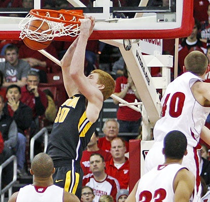 Aaron White scores 18 points in just 20 minutes off the bench as Iowa earns a huge road victory.  (AP)