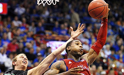 Thomas Robinson pulls down one of his career-high 21 rebounds to help Kansas crush North Dakota. (AP)