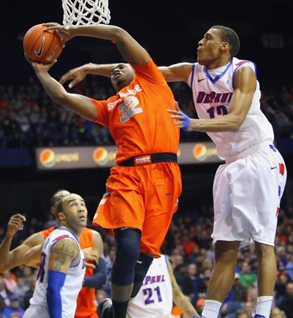 Kris Joseph scores two of his 22 to help secure the Orange's 15th consecutive victory. (US Presswire)