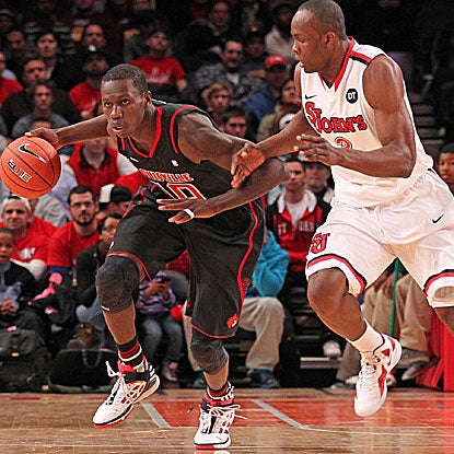 Gorgui Dieng (left) breaks the Red Storm's  press in the Cardinals' return to the win column. (US Presswire)