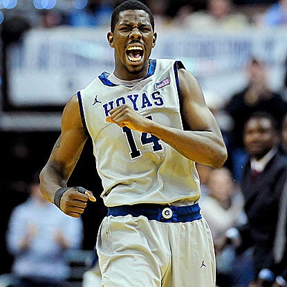 Henry Sims and Georgetown fight back to beat Marquette and win their 11th consecutive game. (US Presswire)