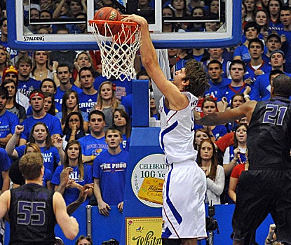 The Jayhawks' Jeff Withey slams home two of his eight points as Kansas wins the in-state battle with Kansas State.  (US Presswire)