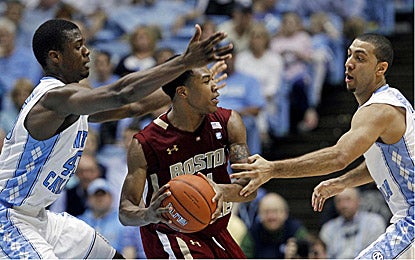 North Carolina's Harrison Barnes (left) scores 25 points to help UNC shut down Boston College in an ACC showdown. (AP)