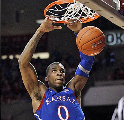 Thomas Robinson is big with 18 points and nine rebounds in Kansas' win over Oklahoma. (AP)